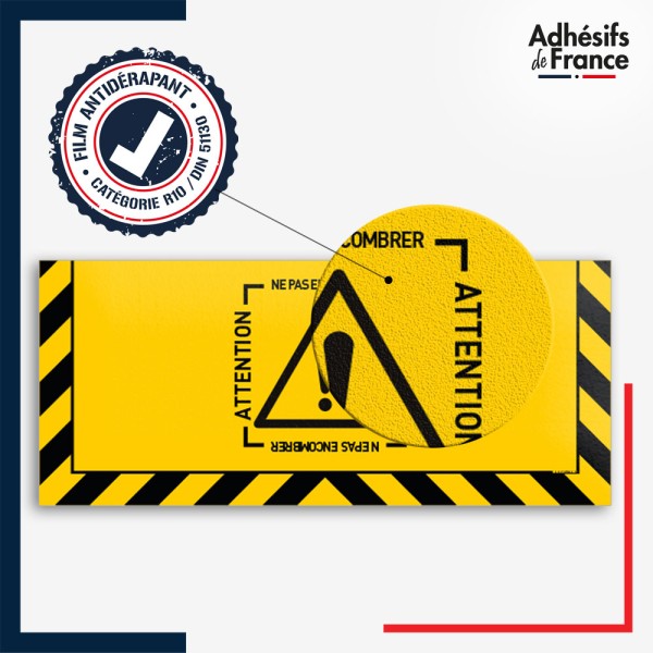 Adhésif sol antidérapant certifié indice R10 / DIN 51130 avec visuel pictogramme Attention ne pas encombrer