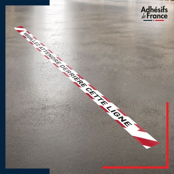 Bande adhésive de sécurité pour délimiter les zones. Bande rouge et blanche - Attendre derrière cette ligne